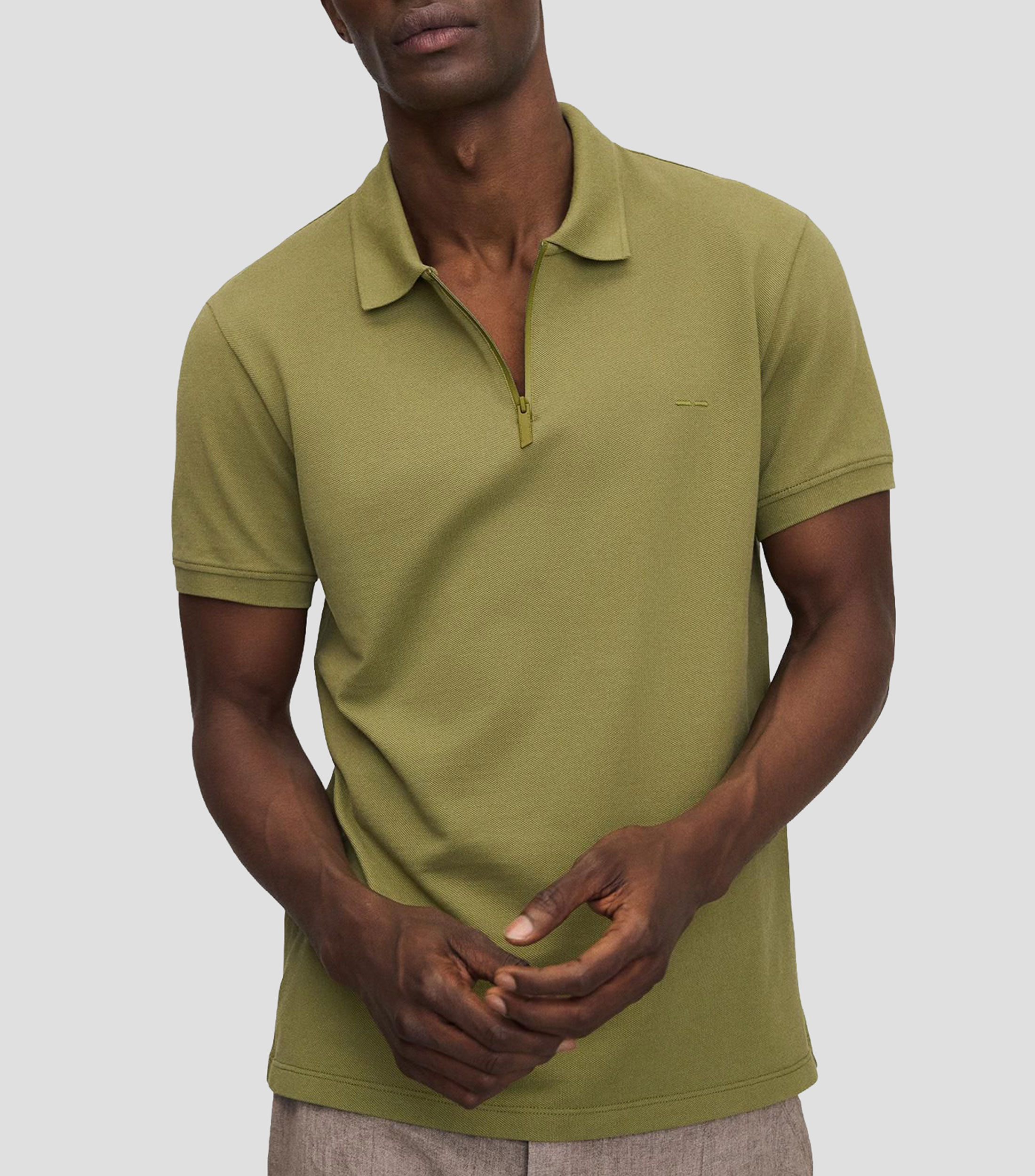 Playera tipo polo con manga corta lisa Hombre